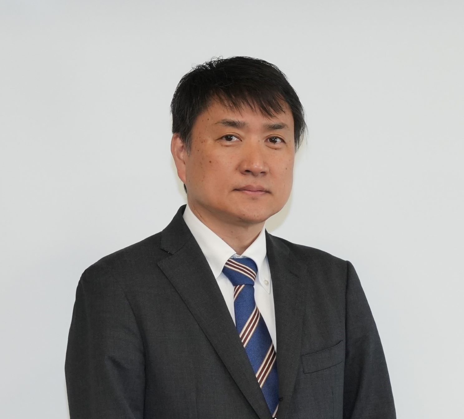 副区長に選任される小林直彦部長